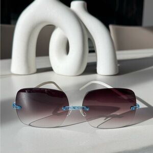 Stylish Brown Gradient Sunglasses with Blue Accents